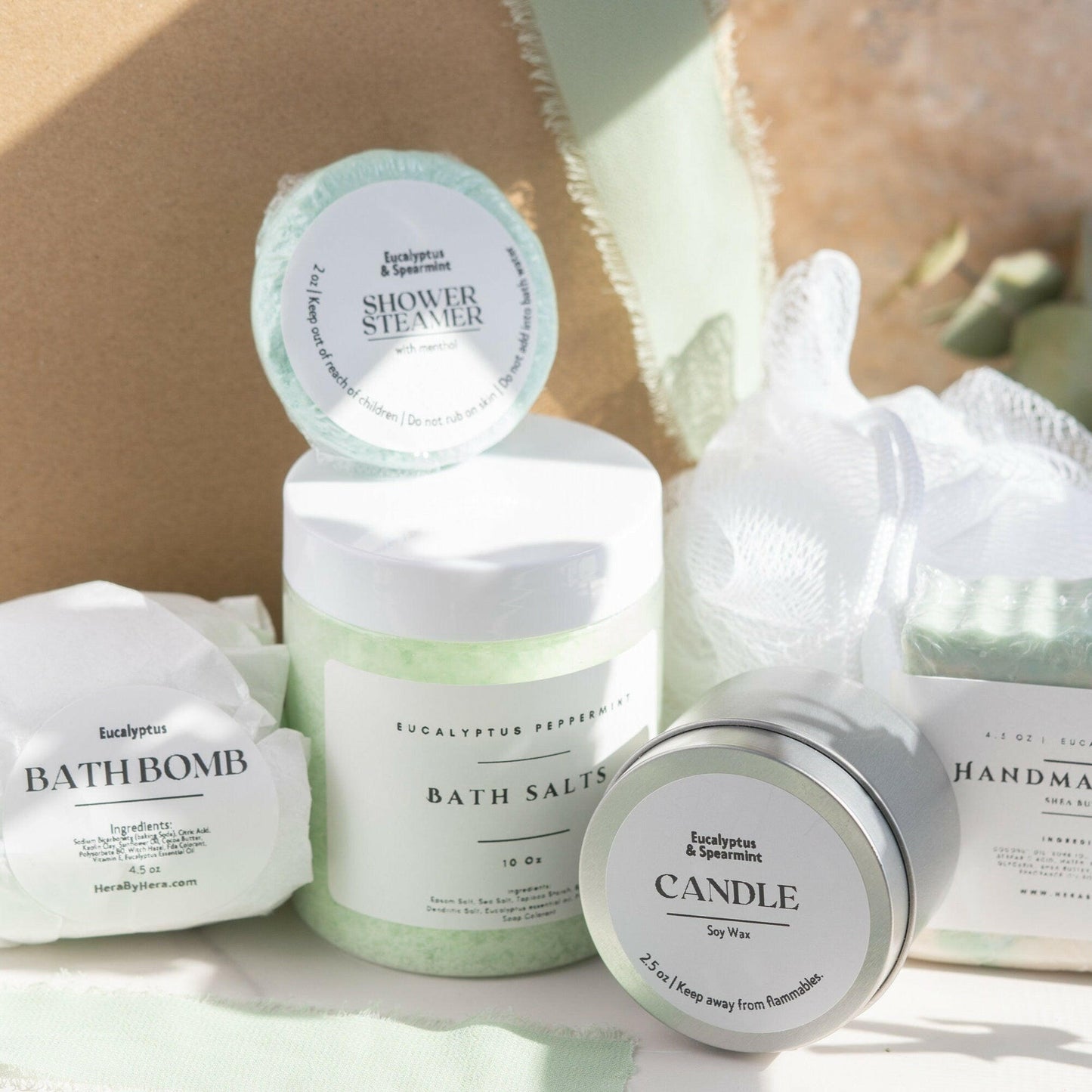 epsom salt bath eucalyptus for sore muscles Self Care Gift Box with eucalyptus scented bath salts, bomb, steamer, handmade soap, candle, and loofah.